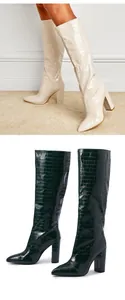 Detail view of crocodile embossed pointed toe chunky heel knee high boots in cream and green
