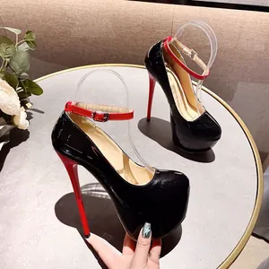 Detail of 16cm sexy black and red color block platform stilettos with ankle strap