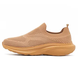 Close-up detail of khaki men's wide-toe breathable knit slip-on sneakers for casual comfort.