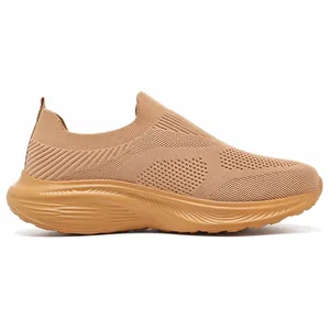Side profile view of breathable men's slip-on flyknit sport shoe in camel brown