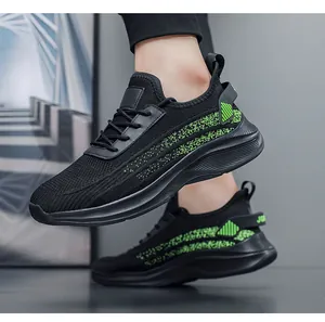 Detailed view of black breathable mesh sneakers with neon green striped patterns
