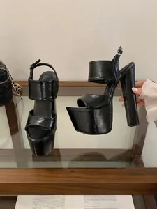 High gloss black patent leather platform sandals with chunky heels for stage performance