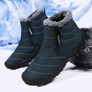 Wasserdichte blaue Winter-Schneestiefel mit Seitenreißverschluss und Kunstfellfutter.