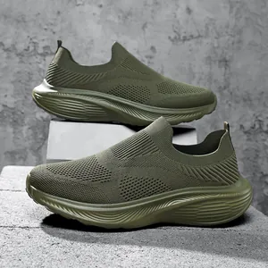 Close-up detail of men's olive green breathable fly-knit slip-on wide-last sports shoes.