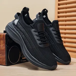 Breathable black flyknit sports shoes for men featuring a soft sole and lace-up design