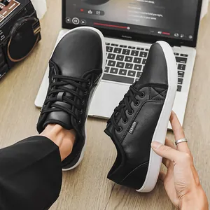 Close-up of black wide toe leather barefoot shoes in a lifestyle setting.