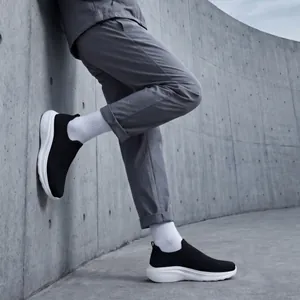 Men's breathable fly-knit slip-on casual sneakers with wide-toe design.