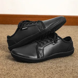 Sleek black wide-toe barefoot leather shoes featuring a comfortable flat non-slip rubber sole