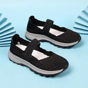 Close-up of black woven women's Mary Jane sneakers with breathable elastic design