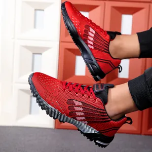 Close-up detail of stylish red and black breathable mesh sport running shoes for men