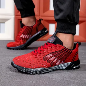 Close-up detail of red and black mesh men's running shoes with SPORT tongue tag