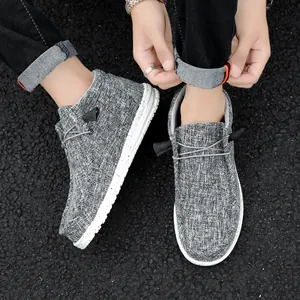 Stylish grey canvas high-top loafers with a slip-on design for casual daily wear