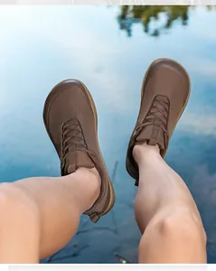 Wide toe men's barefoot hiking shoes in brown, perfect for lightweight outdoor adventures