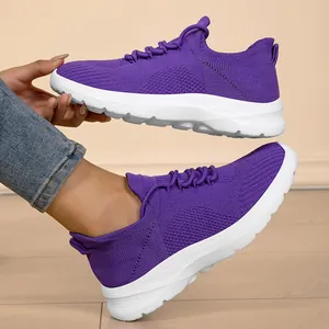 Lightweight purple knit sneakers with white soles for casual summer wear