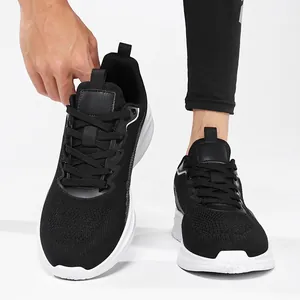 Detailed close-up view of men's breathable black flyknit mesh running shoes with white soles