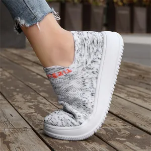 Detailed view of flexible flying knit slip-on sneakers showing comfort and breathability