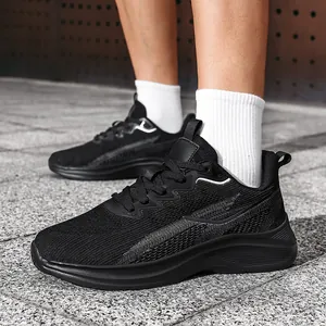 Breathable black flyknit running shoes for men presented in a casual outdoor setting