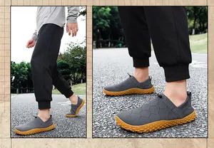 Detail view of breathable gray mesh barefoot shoes with durable gum rubber soles