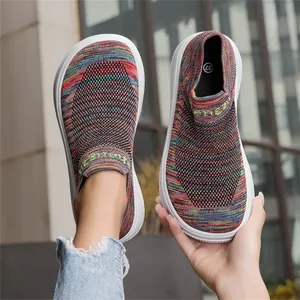 Detailed view of colorful knit breathable slip-on walking shoes for women