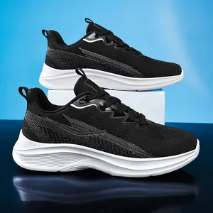 Detailed macro view of men's breathable black flyknit running shoes with white soles