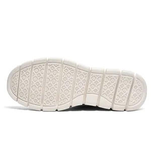 Close-up of the non-slip white outsole of these lightweight men's breathable loafers.