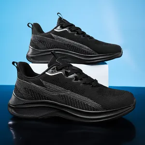 Close-up showing the breathable mesh texture and sleek design of black running shoes.