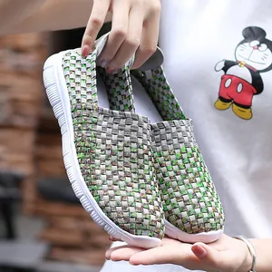 Breathable elastic woven slip-on shoes featuring a lightweight white flexible sole