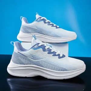 Side view of breathable blue and white fly-knit running shoes for men on blue background