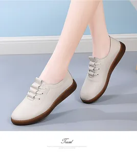 Minimalist beige leather loafers featuring comfortable soft brown anti-slip soles