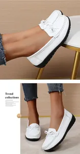 Comfortabele witte leren verpleegstersschoenen voor dames met strikdetail en zwarte zool