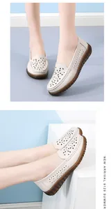 Detailansicht der weißen Leder-Loafer mit atmungsaktivem Laserschnitt-Blumenmuster
