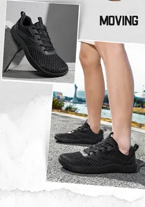 Detailed macro view showing the breathable black mesh texture of men's wide-toe outdoor sneakers