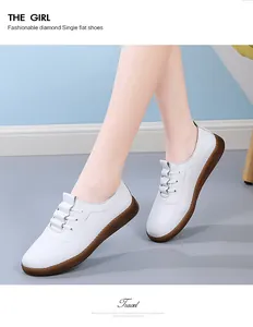 Close-up of women's white leather loafers with soft flexible sole for casual wear