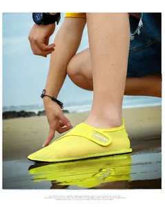 Breathable yellow mesh water shoes for outdoor beach activities with a Velcro closure