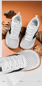 Detailed top view of breathable white mesh outdoor sports shoes with wide toe box design