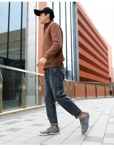 Male model wearing grey breathable mesh loafers walking outdoors in a lifestyle setting
