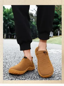 Brown breathable fly-knit slip-on barefoot shoes for men walking on outdoor asphalt road