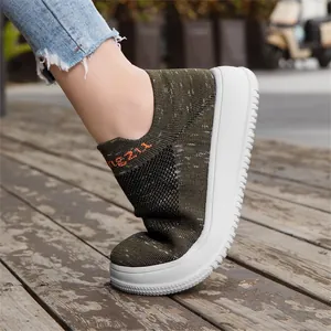 Detail showing superior flexibility of these green breathable knit slip-on sneakers.