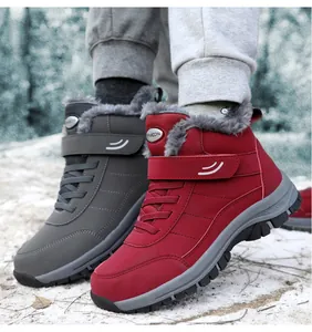 Close-up of waterproof winter snow boots with warm fleece lining and Velcro straps.