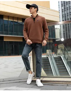 Male model wearing white breathable wide-last mesh loafers in a modern urban outdoor setting