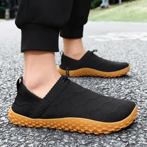 Comfortable black wide-toe slip-on hiking shoes with breathable flyknit mesh upper