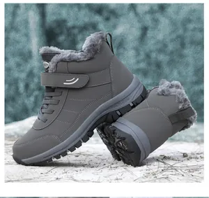 Close-up of grey waterproof snow boots with warm faux fur lining and strap.