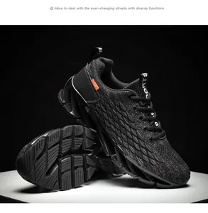 Macro view of black breathable knit running shoes with textured upper and blade sole