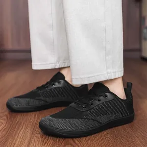 Detailed view of breathable mesh barefoot sneakers with a minimalist wide toe box design