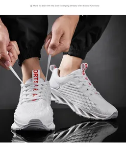 Close-up of white breathable mesh running shoes with hands tying laces