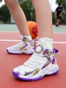 Detailed close-up of white and purple children's basketball shoes on an outdoor court