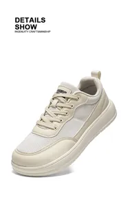 Macro view showing the breathable mesh detail of these stylish beige casual sneakers