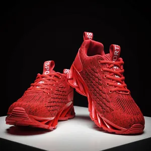Zapatillas rojas transpirables de fly-knit con suela tipo cuchilla