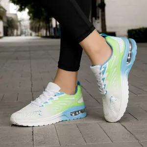 Breathable flyknit women's running shoes with cushioning air sole in vibrant gradient colors.