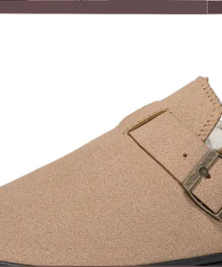 Macro view of warm fleece-lined beige suede slippers with vintage metal buckle detail.
